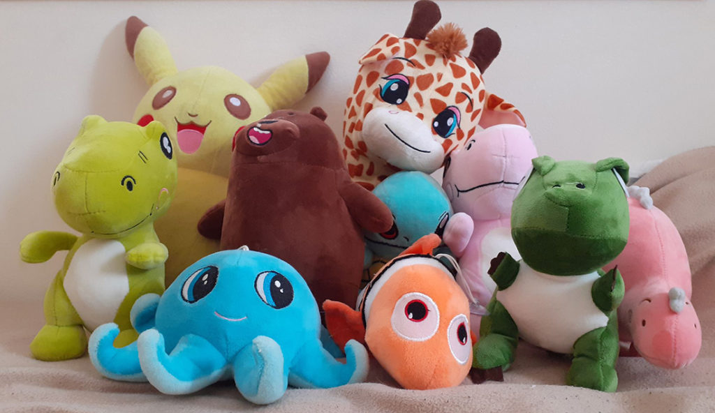 A collection of teddies won from claw machines