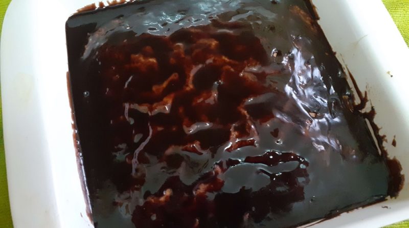 A Brazilian carrot cake with a chocolate sauce glaze