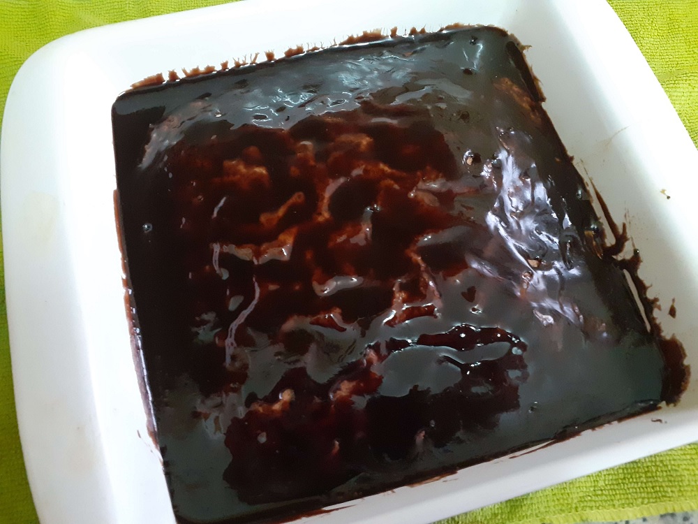 A Brazilian carrot cake with a chocolate sauce glaze